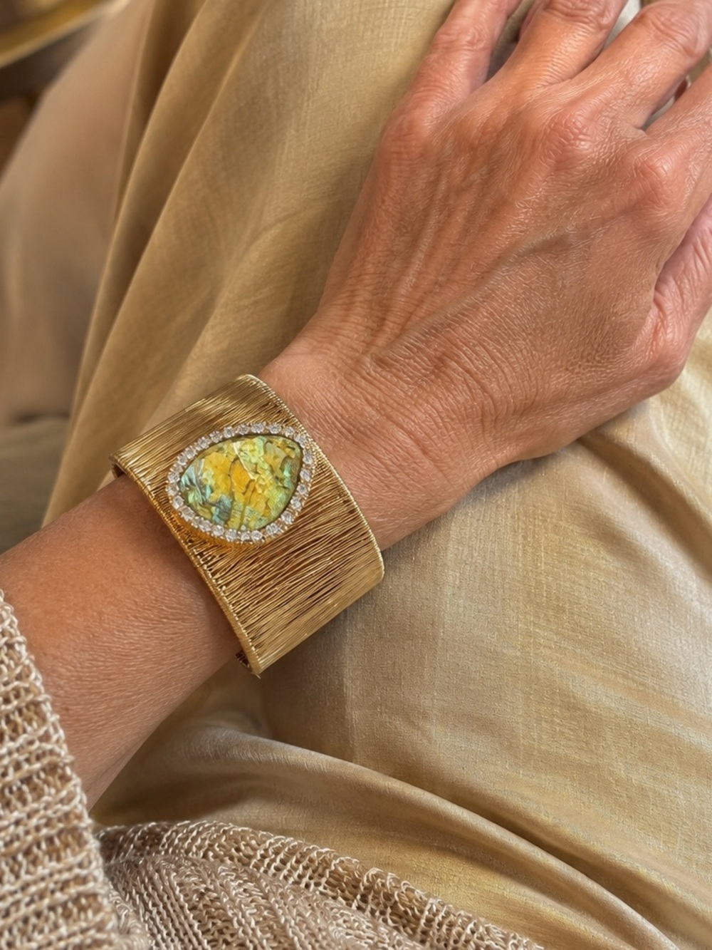 Gold Textured Cuff Bracelet with Yellow-Green Stone